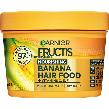 Garnier Fructis Banana Hair Food Mask: multi-use, 97% natural, vegan formula for intense shine and deep moisture in dry hair.