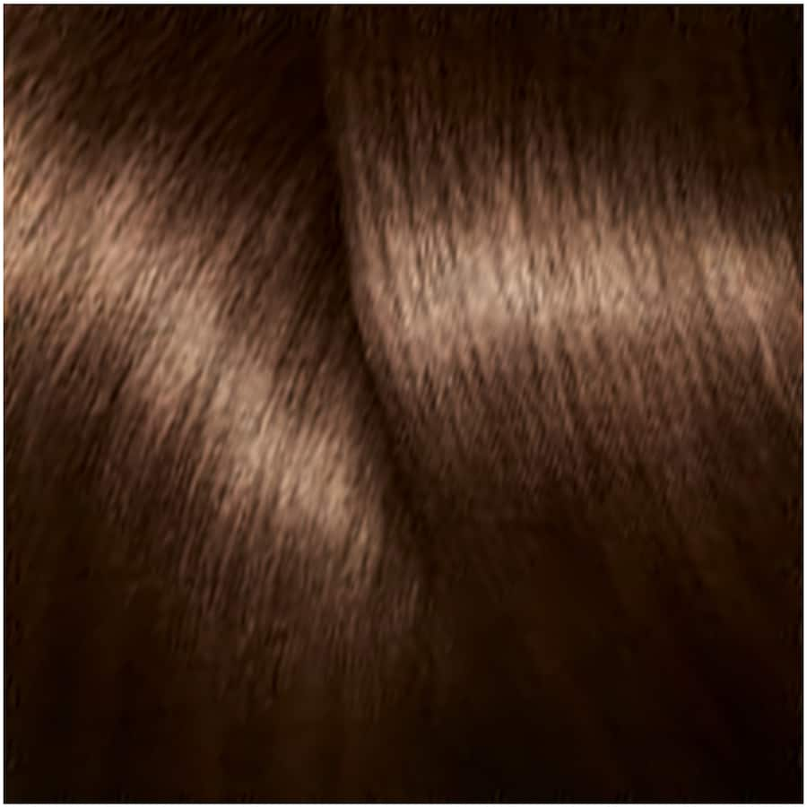 L'Oreal Paris Magic Retouch Cool Brown spray instantly conceals grey roots, blending seamlessly for a salon-fresh look.