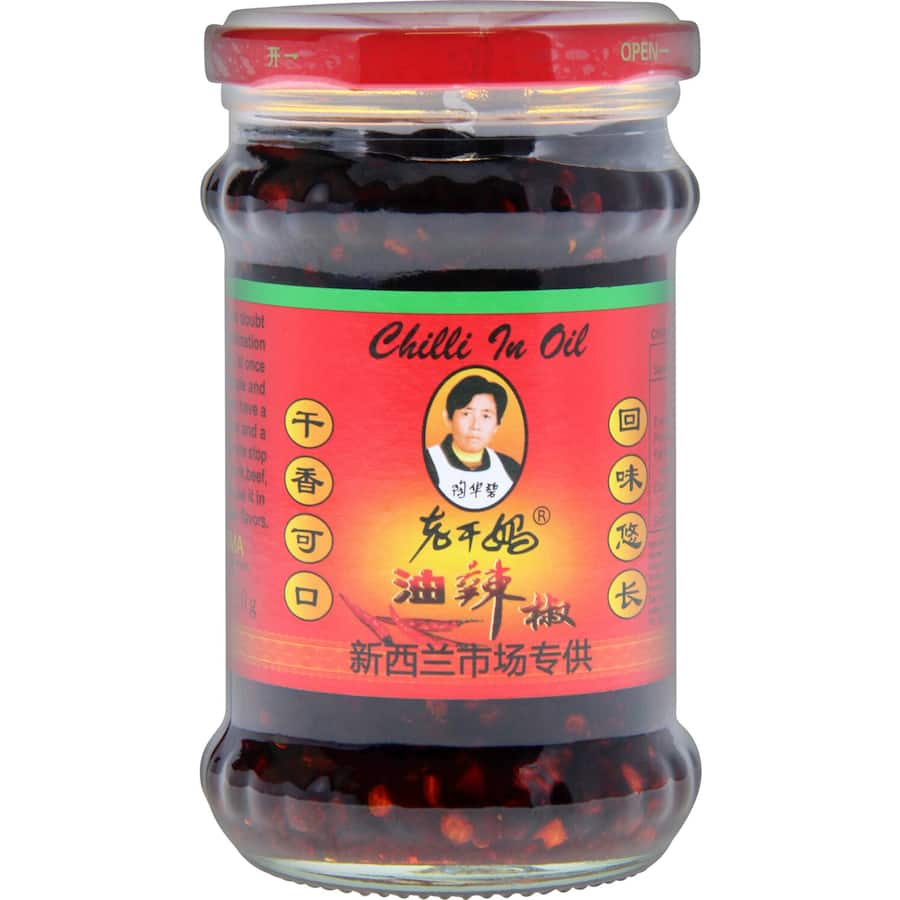 Laoganma Asian Chilli In Oil adds fiery flavor to dishes like noodles and stir-fries with its premium blend of spices.