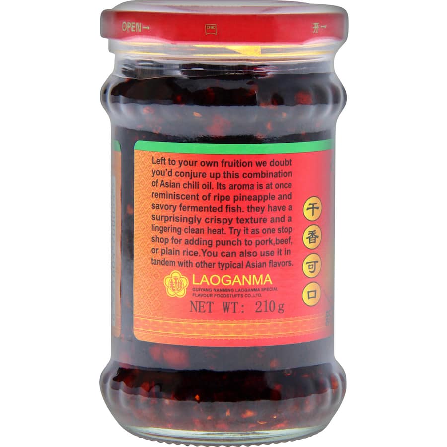 Laoganma Asian Chilli In Oil bottle showcasing a fiery blend for enhancing noodles, stir-fries, and dipping sauces.