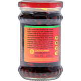 Laoganma Asian Chilli In Oil bottle showcasing a fiery blend for enhancing noodles, stir-fries, and dipping sauces.