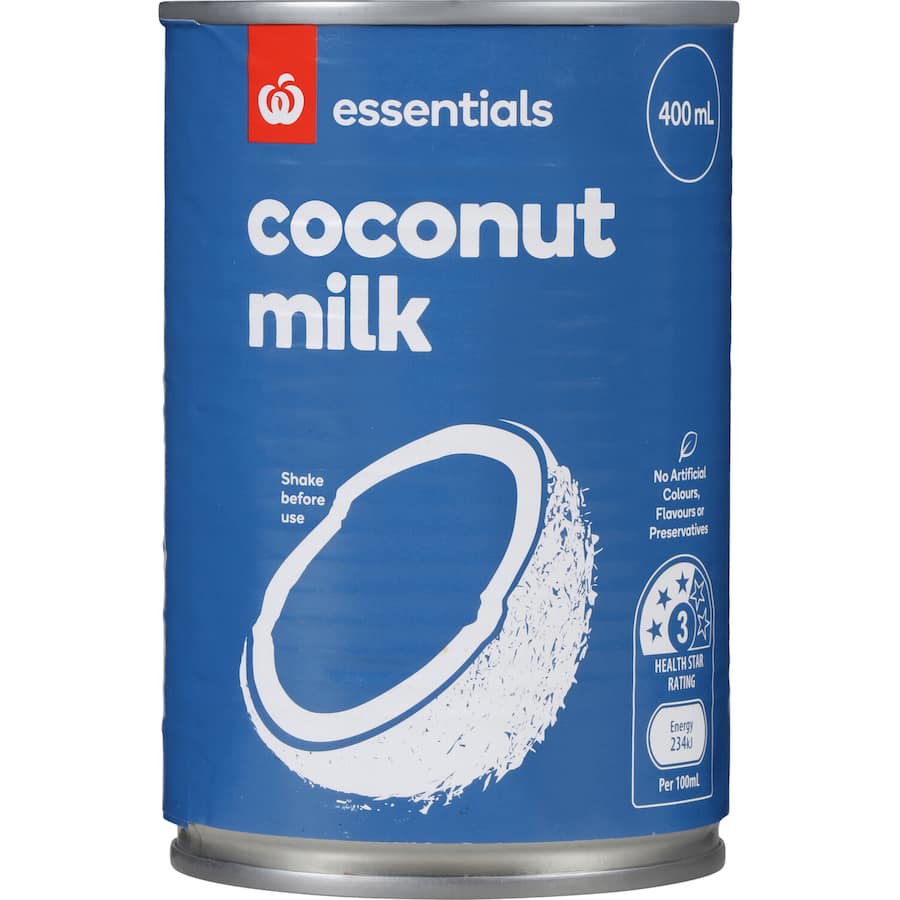 Creamy Essentials Coconut Milk in a carton, ideal for vegan cooking, smoothies, soups, and curries, gluten-free and natural.