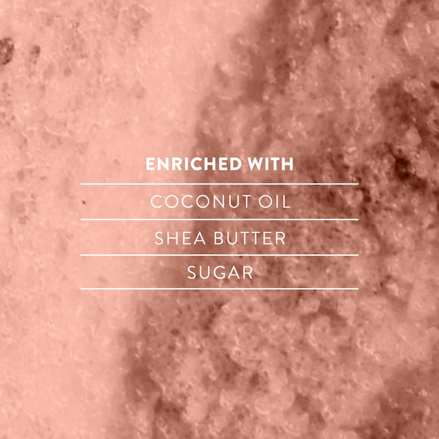 Luxurious Glow Lab Body Scrub Coconut with Shea Butter and Sugar, perfect for exfoliating and hydrating skin for a silky finish.