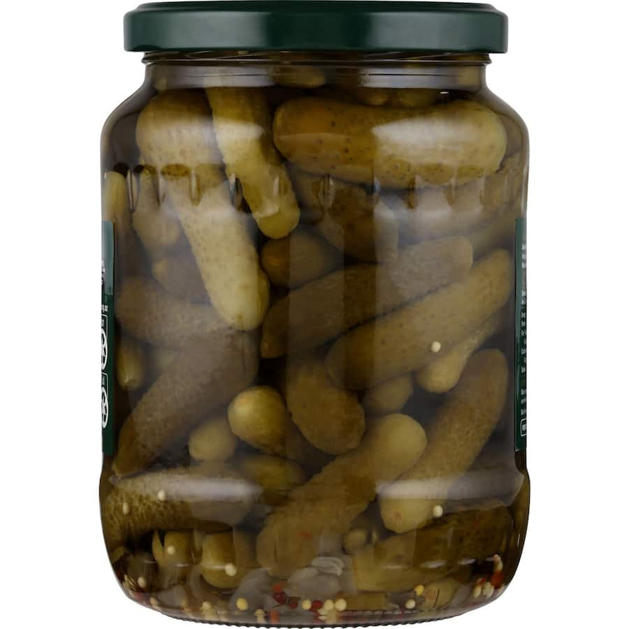 Delmaine Gherkins Baby are crunchy, firm cornichons ideal for snacking, gourmet dishes, and adding zest to cocktails.