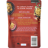 Delicious Passage To India Coconut & Cashew Chicken, featuring marinated chicken in creamy coconut sauce with roasted cashews.