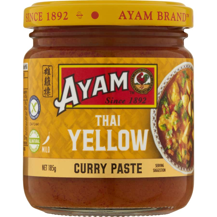 Ayam Thai Yellow Curry Paste, a gluten-free blend of lemongrass, turmeric, and garlic for authentic Thai cuisine.