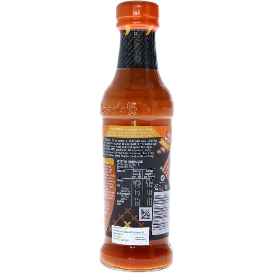 Nandos Peri Peri Marinade Medium bottle showcasing zesty, spicy flavor for marinating meats and vegetables.