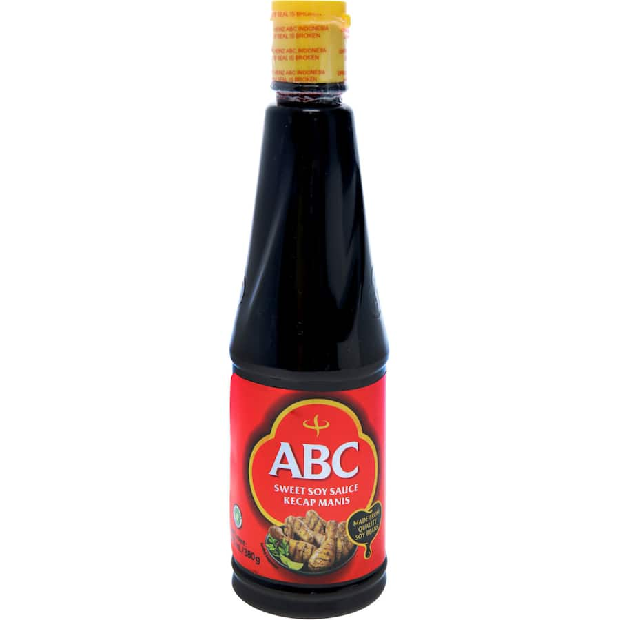 Bottles of Abc Sweet Soy Sauce Kecap Manis, a traditional Indonesian condiment ideal for enhancing dishes with sweet and savory flavors.