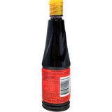 Bottle of Abc Sweet Soy Sauce Kecap Manis, a rich Indonesian condiment for enhancing dishes with sweet and savory flavors.