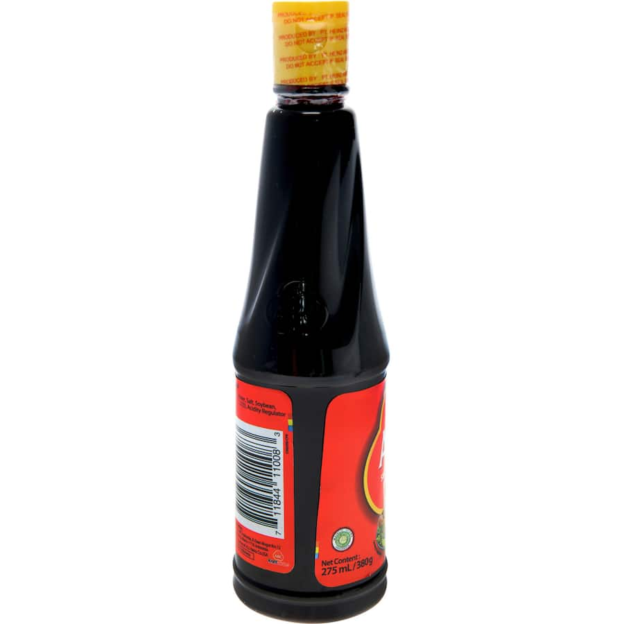 Bottle of Abc Sweet Soy Sauce Kecap Manis, a rich Indonesian condiment for enhancing flavors in various dishes.