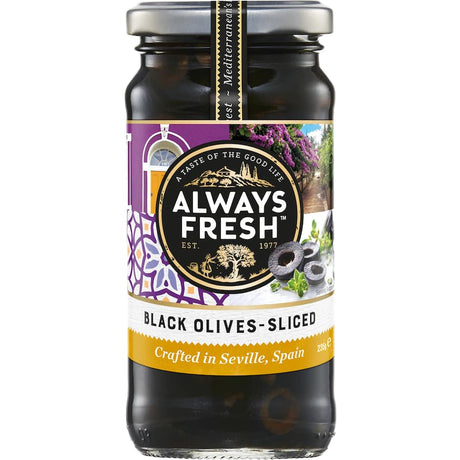 Sliced black olives in a jar, perfect for salads, pizzas, and Mediterranean dishes, offering rich flavor and health benefits.