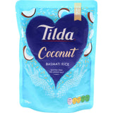 Tilda Steamed Rice Coconut Basmati in a pouch, featuring fluffy grains infused with coconut, perfect for curries and quick meals.