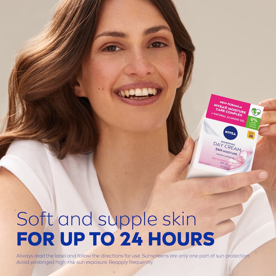 Nivea Nourishing Day Cream with SPF 30 hydrates and protects skin, featuring almond oil for 24-hour moisture and anti-aging benefits.