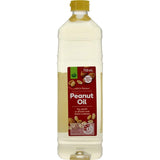 Woolworths Peanut Oil in a 750ml bottle, ideal for frying, sautéing, and enhancing Asian dishes with a mild, nutty flavor.