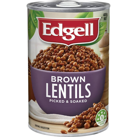 Edgell Brown Lentils in a bowl, seasoned with sea salt and tomato paste, showcasing their rich brown color and texture.