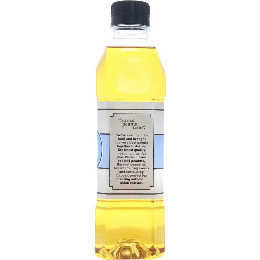 Bottled peanut oil blended from high-quality roasted peanuts, ideal for Asian cooking and enhancing various dishes.