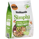 Bowl of Hubbards Simply Mega Muesli with fruits and nuts, showcasing its wholesome grains and crunchy textures.