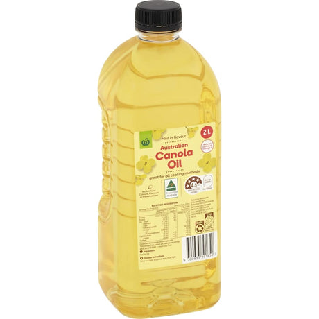 Woolworths Canola Oil 2L bottle, 100% pure, rich in omega 3, versatile for frying and baking, enhancing healthy meals.