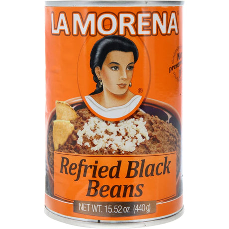 Creamy La Morena black refried beans, expertly seasoned for authentic Mexican flavor in burritos or as a side dish.