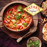 Pataks Madras Paste: Aromatic spice blend for authentic Indian curry, perfect for enhancing dishes with bold flavors.