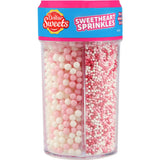 Heart-shaped sprinkles in vibrant colors, perfect for decorating baked goods like cupcakes and cookies.