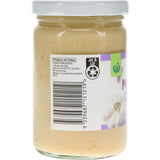 Woolworths Minced Garlic: convenient, 99% rehydrated garlic adding rich flavor to dishes with no salt or preservatives.