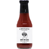 F. Whitlock & Sons Smoky BBQ Sauce bottle showcasing rich tomato and molasses blend for flavorful grilling and marinading.