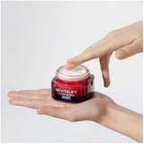 L'Oreal Revitalift Night Cream Laser X3, an anti-aging treatment, reduces wrinkles and enhances skin's radiance overnight.