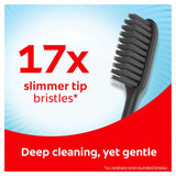 Colgate Slim Soft Toothbrush features charcoal-infused soft bristles for effective cleaning and antibacterial protection.