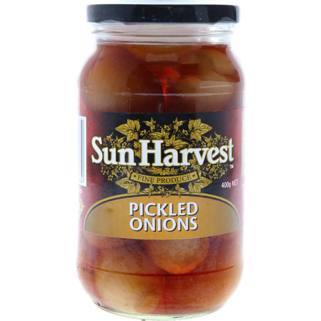 Tangy Sun Harvest Pickled Onions, a versatile, vegetarian condiment perfect for enhancing cheese platters, sandwiches, and pasta.