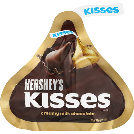 Hershey's Kisses Chocolates Creamy Milk, smooth milk chocolate kisses wrapped in foil, ideal for sharing or indulging.