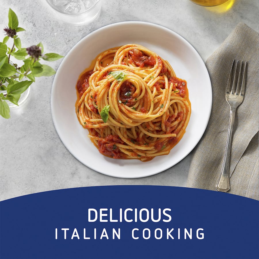 Authentic Barilla Pasta Sauce featuring rich basil and tomato, made with sun-ripened Italian tomatoes for flavorful meals.