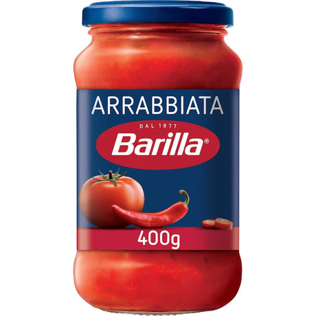 Barilla Arrabiata Chilli pasta sauce in a jar, showcasing rich Italian tomatoes and spicy chillis for a flavorful meal.