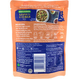 Tilda Steamed Rice Brown Basmati & Quinoa in a microwavable pouch, featuring healthy grains and rich nutrients.