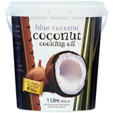 Blue Coconut Coconut Oil in a jar, showcasing its tropical essence for healthy cooking and skin care.