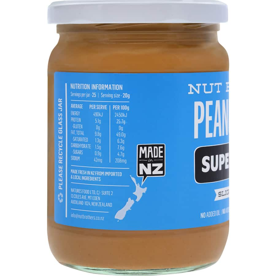 Nut Brothers Smooth Slightly Salted Peanut Butter in a jar, featuring a creamy texture with a hint of salt for versatile use.