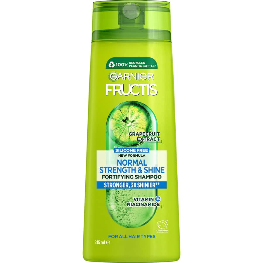 Revitalizing Garnier Fructis Shampoo for normal hair, enriched with grapefruit extract and vitamins for healthier, shinier locks.