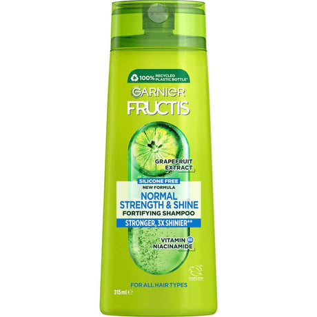 Revitalizing Garnier Fructis Shampoo for normal hair, enriched with grapefruit extract and vitamins for healthier, shinier locks.