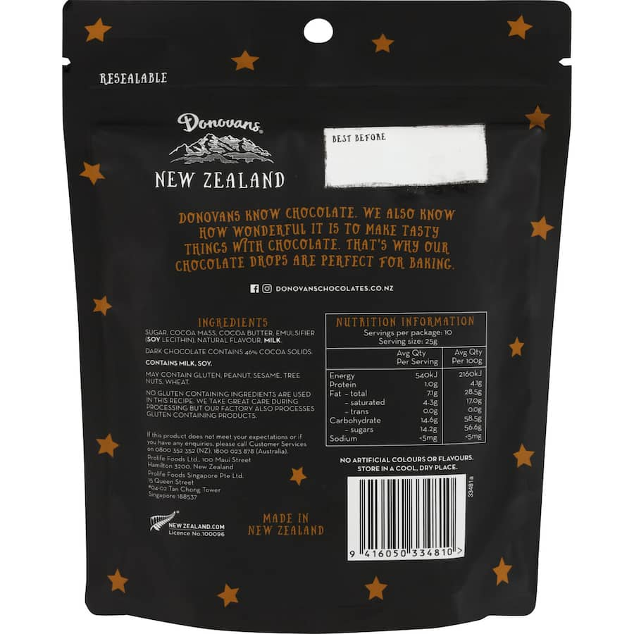 Rich dark chocolate drops with smooth texture, perfect for baking, snacking, or decorating desserts. Indulge in luxury!