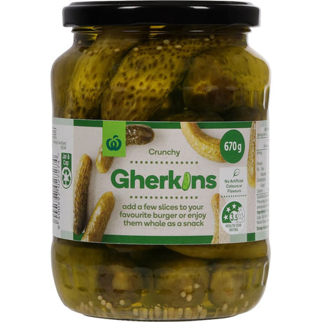 Crunchy Woolworths Green Gherkins, made with 54% gherkins, enhance meals with their tangy flavor and natural ingredients.