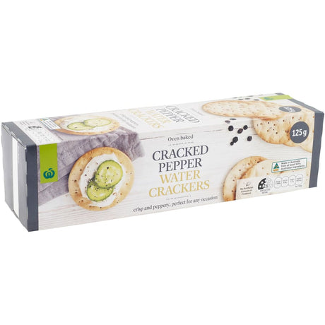 Woolworths Water Crackers with Cracked Pepper, 125g box, crispy, gourmet snack ideal for pairing with cheeses and spreads.