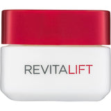 L'Oreal Paris Revitalift Eye Cream pottle, an anti-aging formula that hydrates, firms, and reduces wrinkles around the eyes.