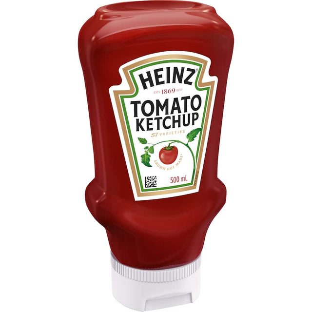 A bottle of Heinz Tomato Ketchup, a classic sweet and tangy condiment, perfect for burgers, fries, and BBQs.