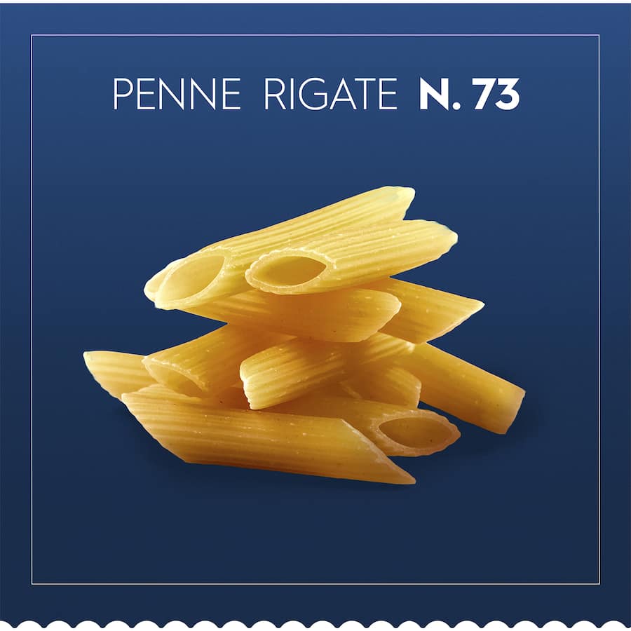 Barilla Pasta Penne Rigate No. 73, a classic tubular pasta ideal for rich sauces, perfect for authentic Italian dishes.