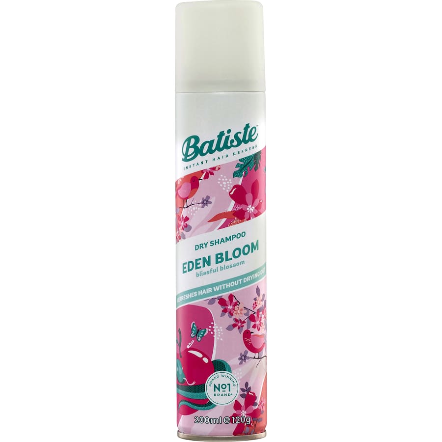 Batiste Dry Shampoo Eden can, featuring a vibrant design, revitalizes hair with a blissful blossom scent and absorbs oil instantly.