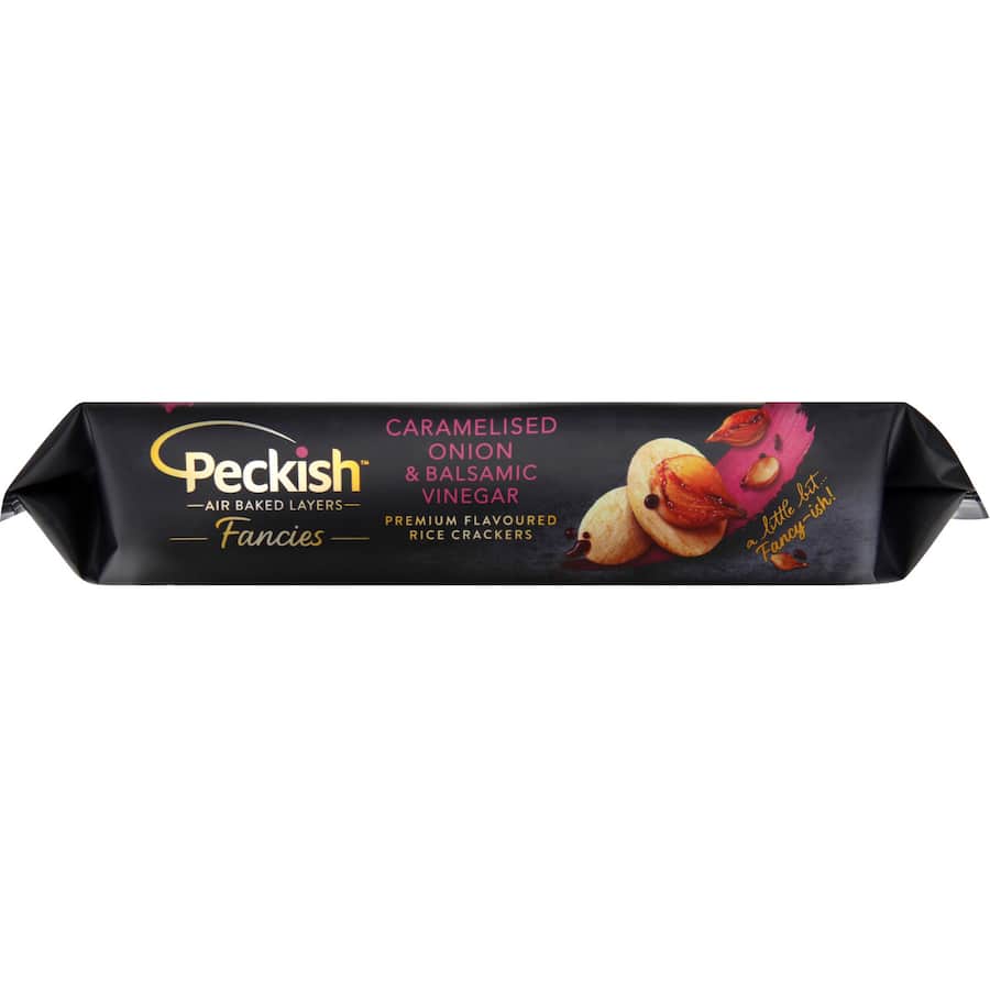 Caramelised onion and balsamic rice crackers, gluten-free, perfect for gourmet snacking and pairing with cheeses.