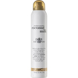 Ogx Dry Shampoo with Coconut Milk revitalizes all hair types, eliminating oil while infusing a refreshing tropical scent.