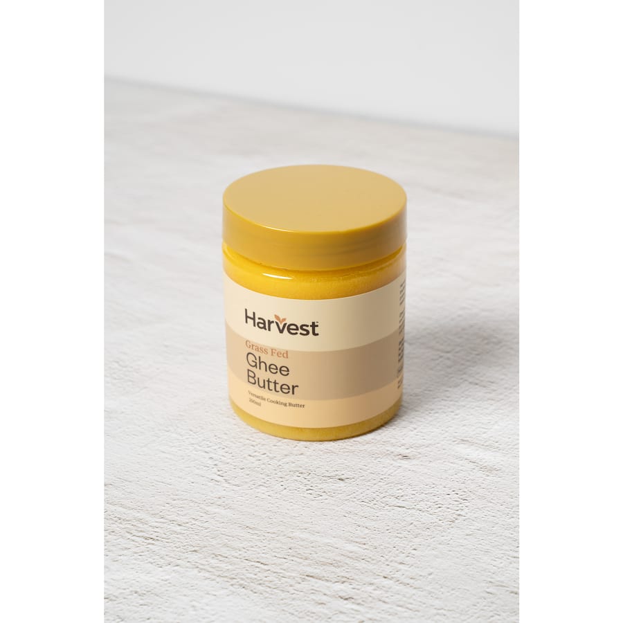 Harvest Grass Fed Ghee Butter in a jar, showcasing its rich, golden color and ideal for keto and paleo cooking.