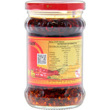 Laoganma Spicy Chilli Sauce bottle showcasing premium ingredients, ideal for adding heat and flavor to any dish.