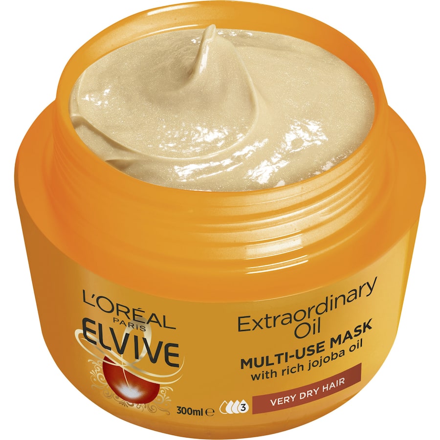 L'Oreal Paris Elvive Hair Mask Extraordinary Oil nourishes dry hair with 6 flower oils for smooth, hydrated, and non-greasy strands.